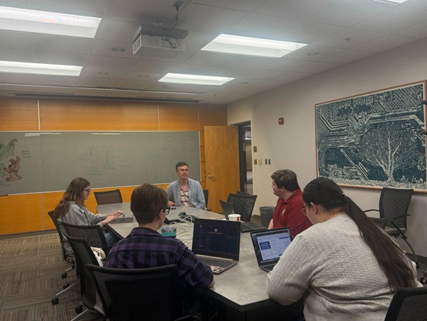 Students discussing College Democrats at IUK plans for this fall semester