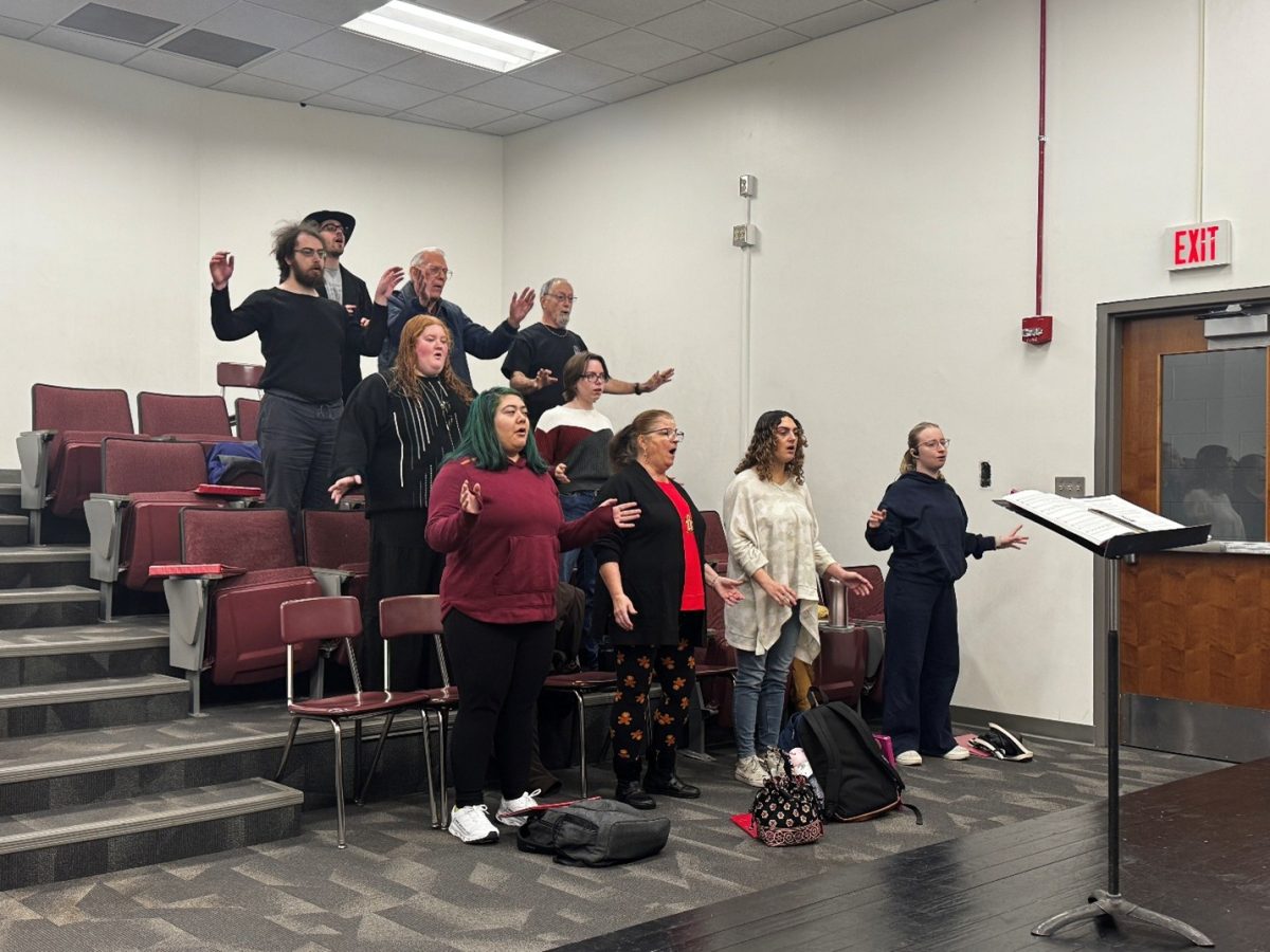 Warming up is very important to the Cougar Choir, as it helps prepare their vocals.
