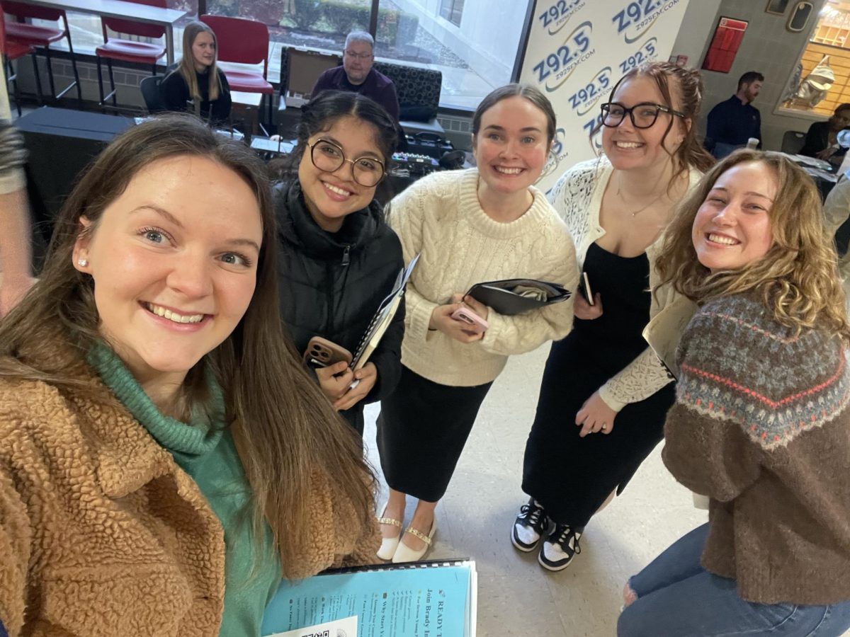 Seniors (left to right) Joslyn Knox, Molly Sallee, Isabel Correa, Madi Guinn, and Jenna Waterman attending the career fair